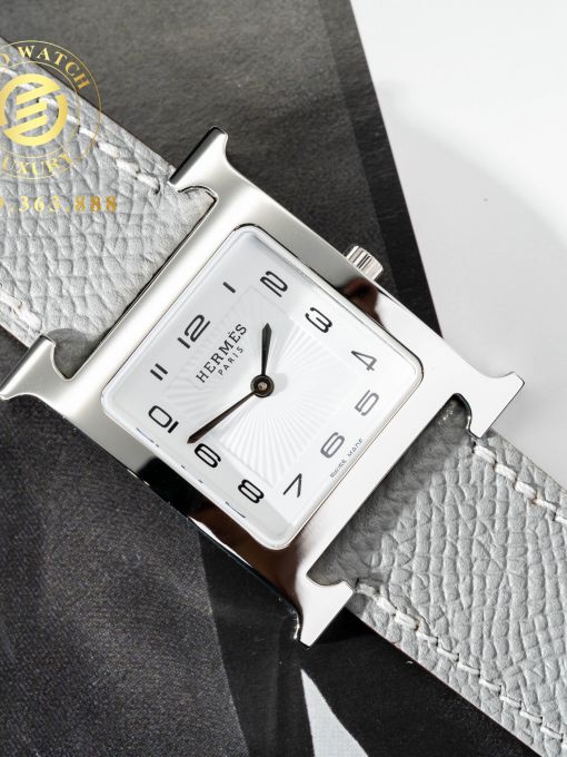 Đồng Hồ: Hermes Heure H Ladies 26x26MM Vỏ Trơn Mặt Trắng Máy Pin Rep 1:1